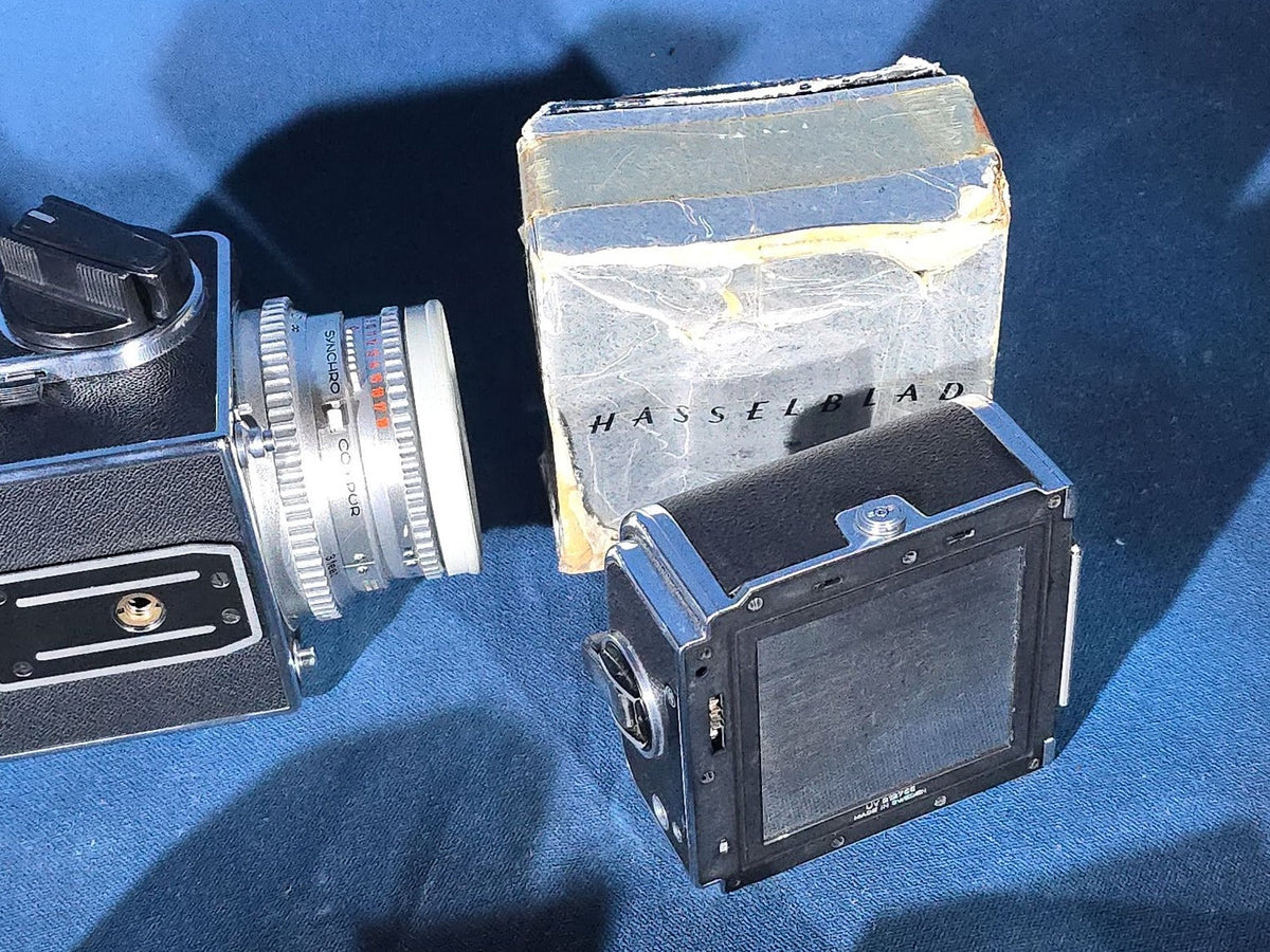 Vintage Hasselblad 500C/M Medium Format Camera with Carl Zeiss Planar 80mm and Distagon Lenses, Film Back, Prism Viewfinder, Extension Tube, and Accessories