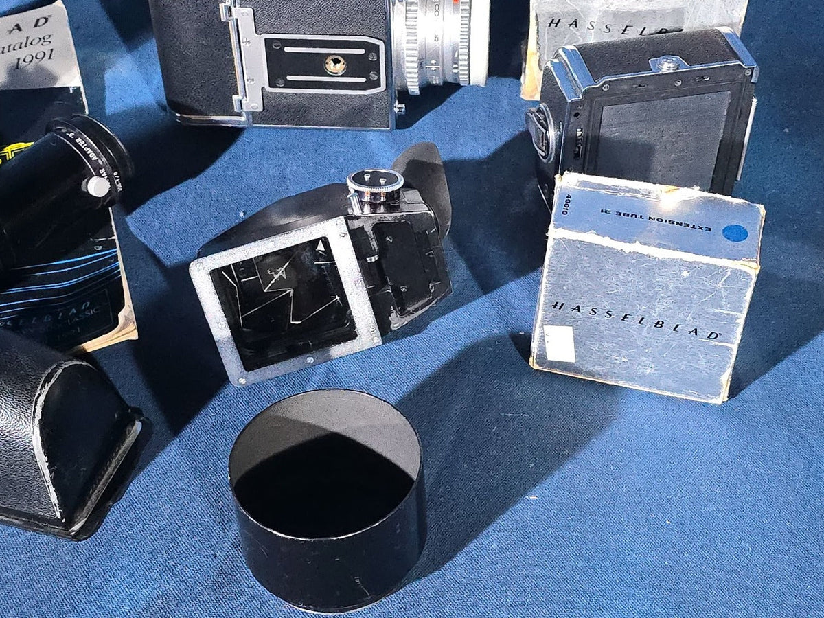 Vintage Hasselblad 500C/M Medium Format Camera with Carl Zeiss Planar 80mm and Distagon Lenses, Film Back, Prism Viewfinder, Extension Tube, and Accessories