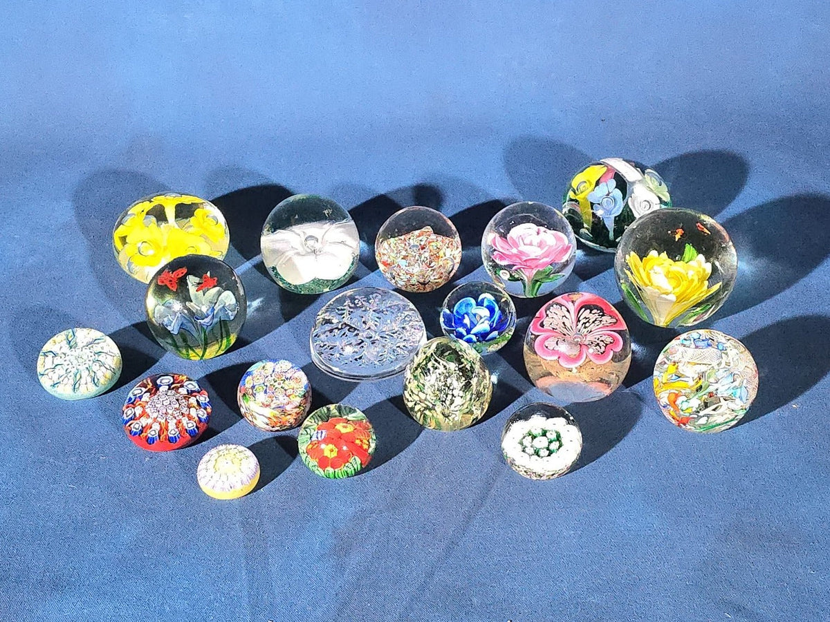 Grouping of 18 Vintage Glass Paperweights including Millefiori, Floral, and Scramble Designs