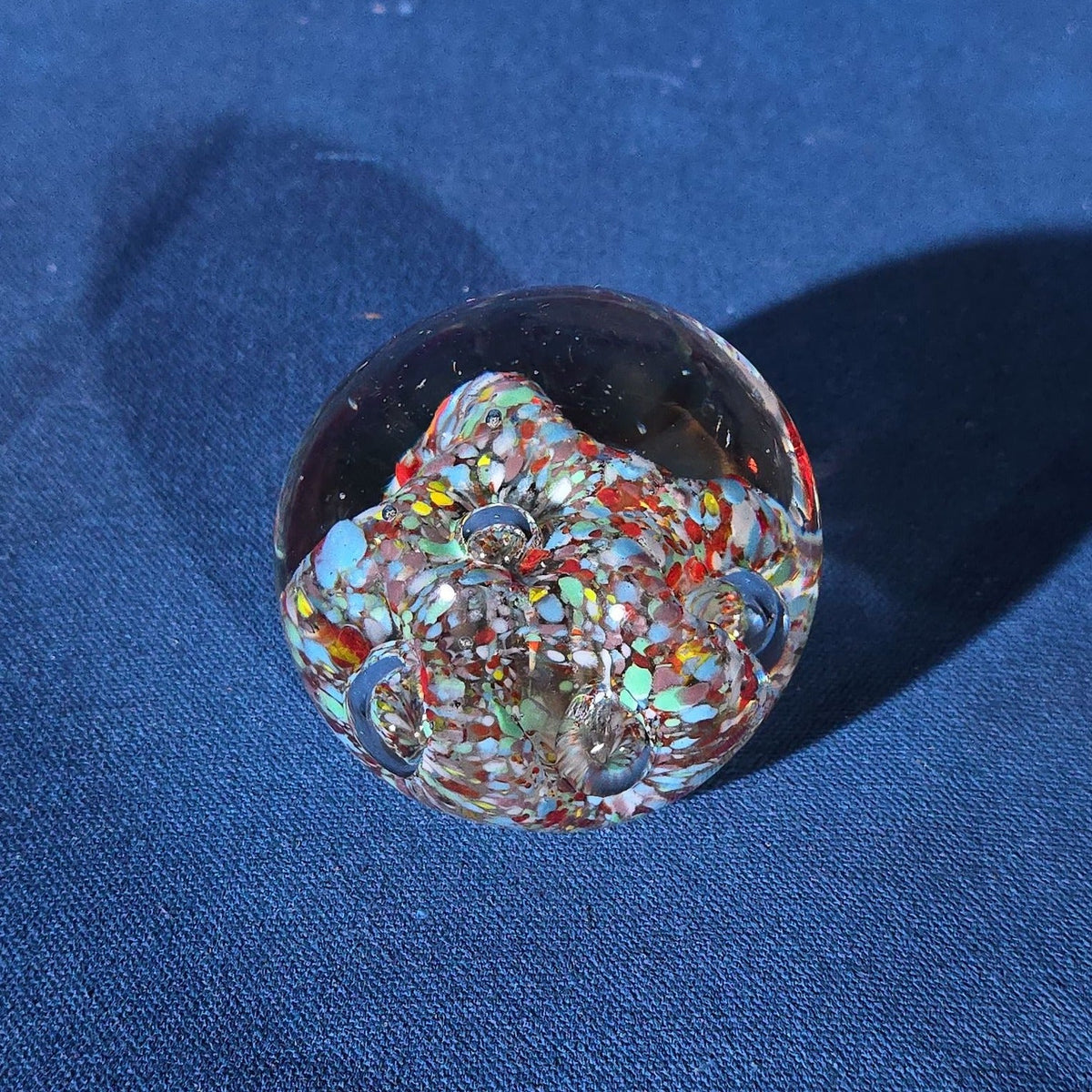 Grouping of 18 Vintage Glass Paperweights including Millefiori, Floral, and Scramble Designs