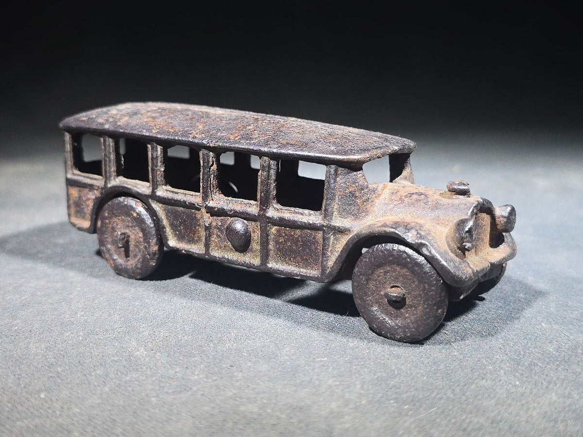 Antique Cast Iron Toy Bus with Disc Wheels