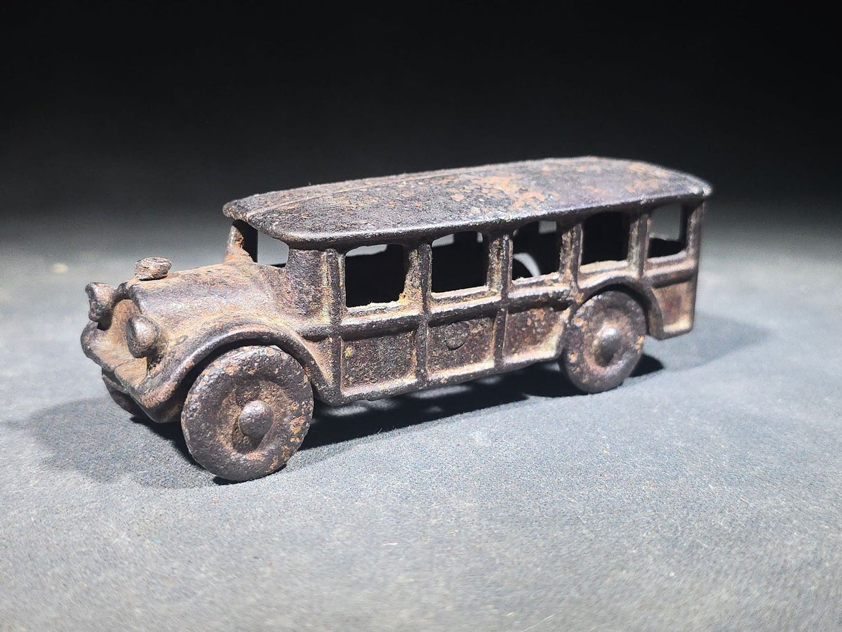 Antique Cast Iron Toy Bus with Disc Wheels