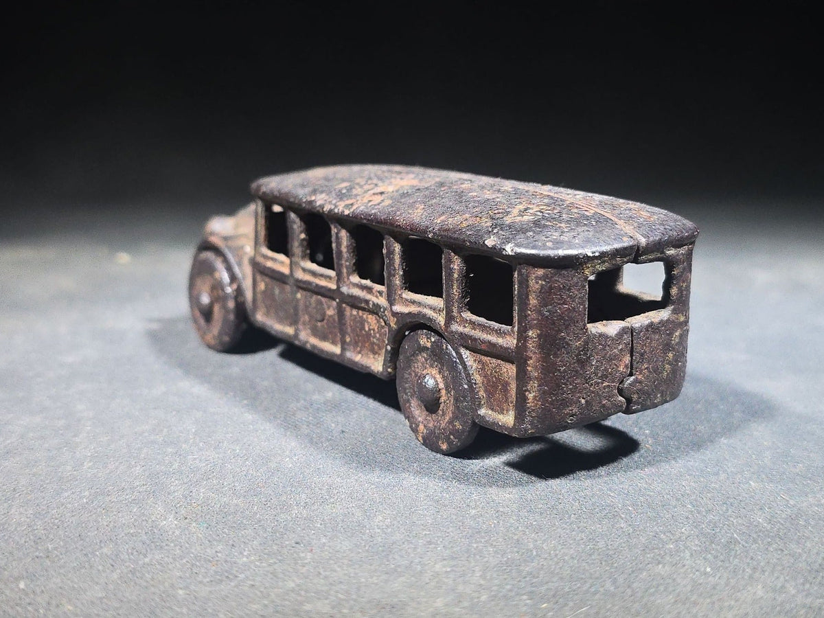 Antique Cast Iron Toy Bus with Disc Wheels