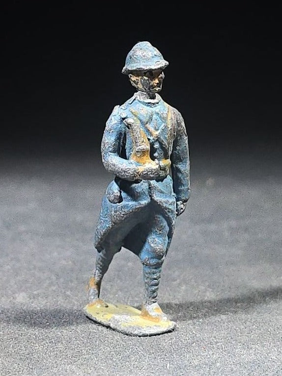 Antique Painted Metal Toy Soldier Figure of a French WWI Infantry Soldier in Horizon Blue Uniform with Adrian Helmet, Marching Pose