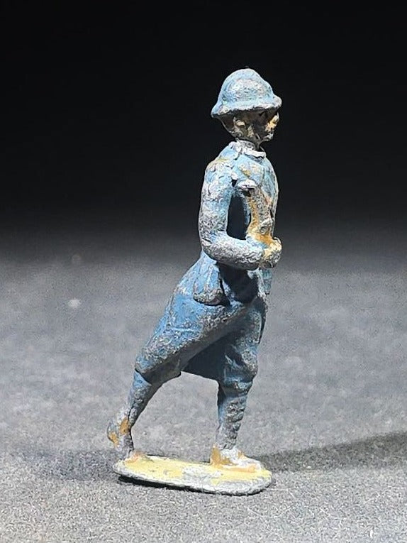Antique Painted Metal Toy Soldier Figure of a French WWI Infantry Soldier in Horizon Blue Uniform with Adrian Helmet, Marching Pose