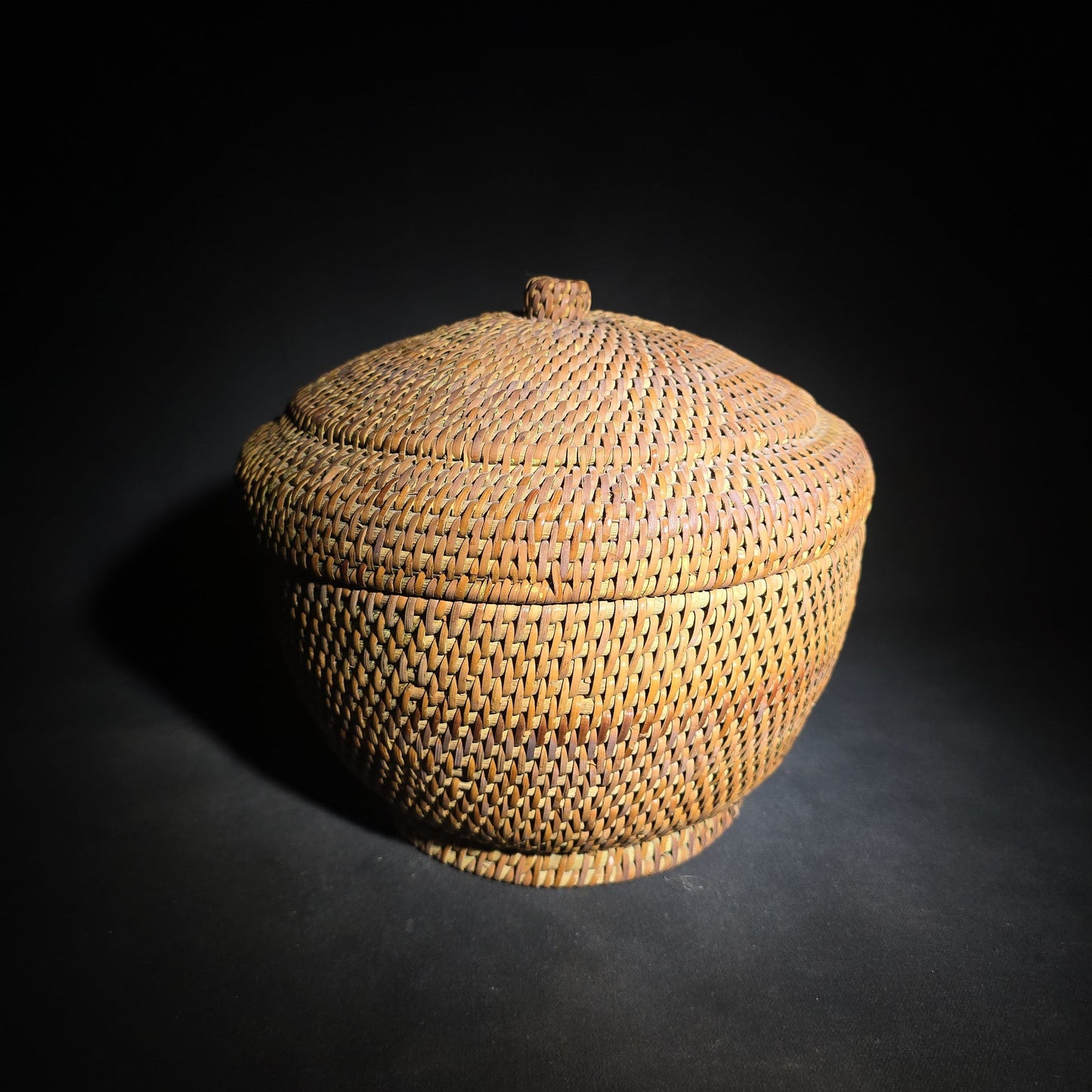 Pair of Vintage Woven Baskets including a Gourd Vessel with Leather Strap and Woven Stopper and a Coiled Lidded Basket