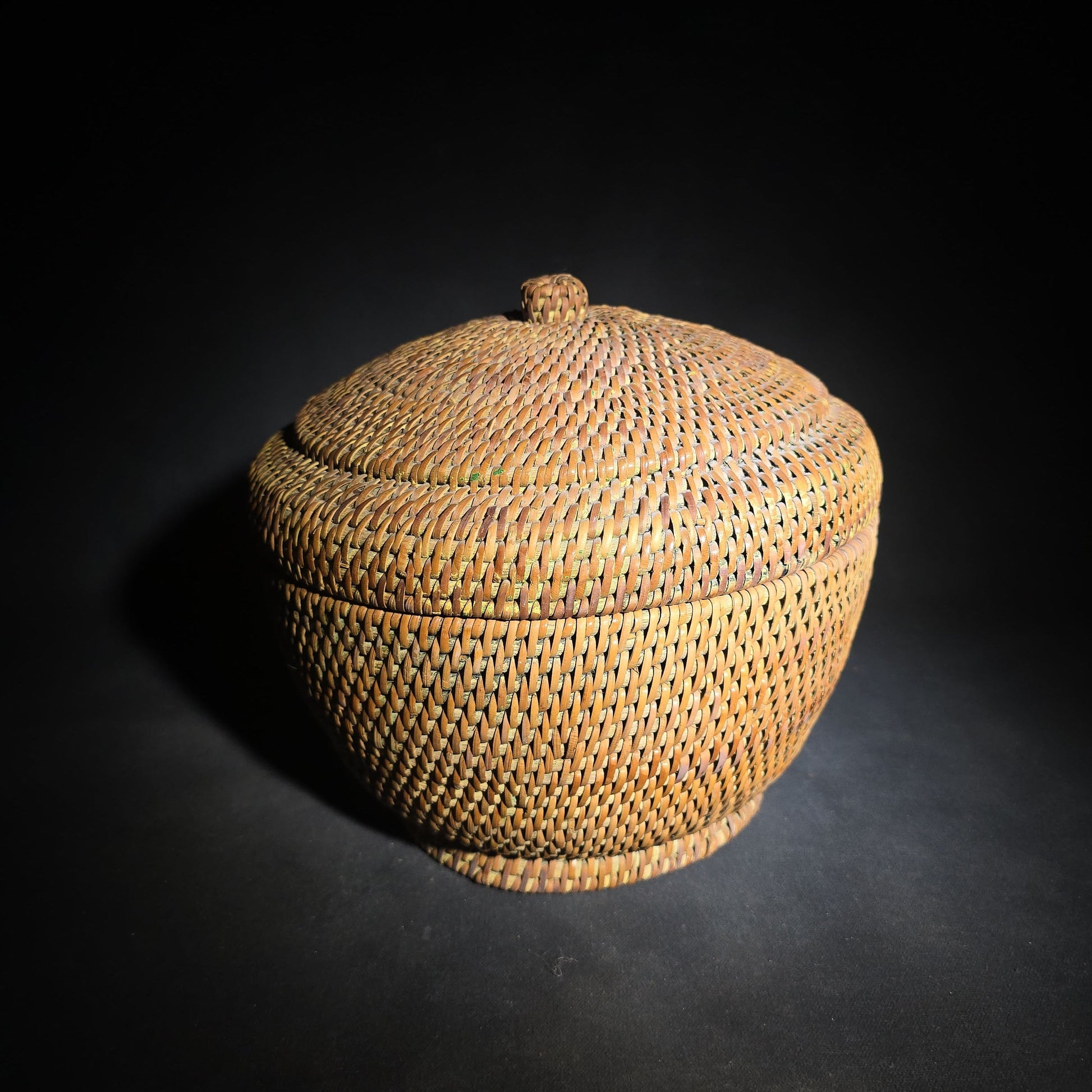 Pair of Vintage Woven Baskets including a Gourd Vessel with Leather Strap and Woven Stopper and a Coiled Lidded Basket