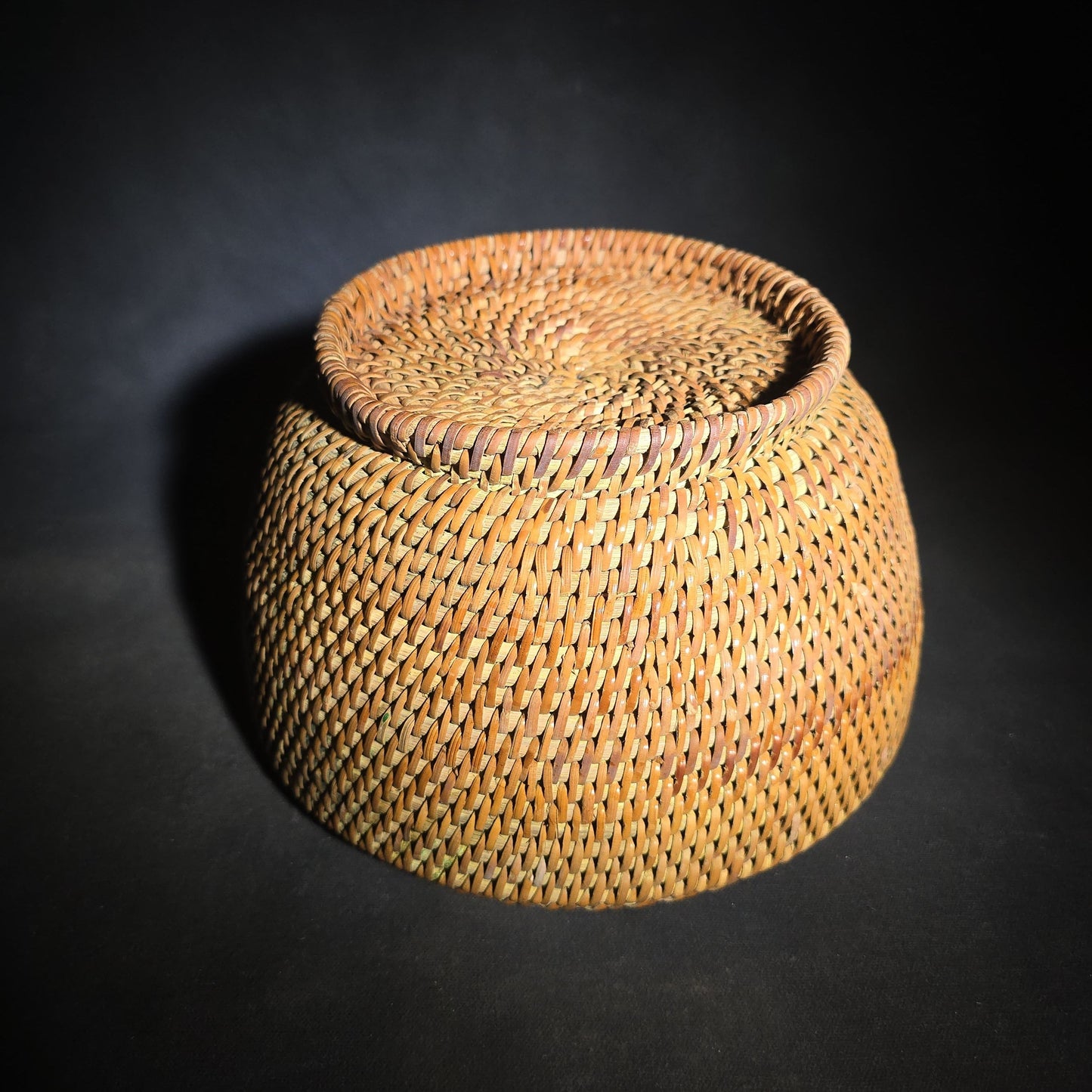 Pair of Vintage Woven Baskets including a Gourd Vessel with Leather Strap and Woven Stopper and a Coiled Lidded Basket