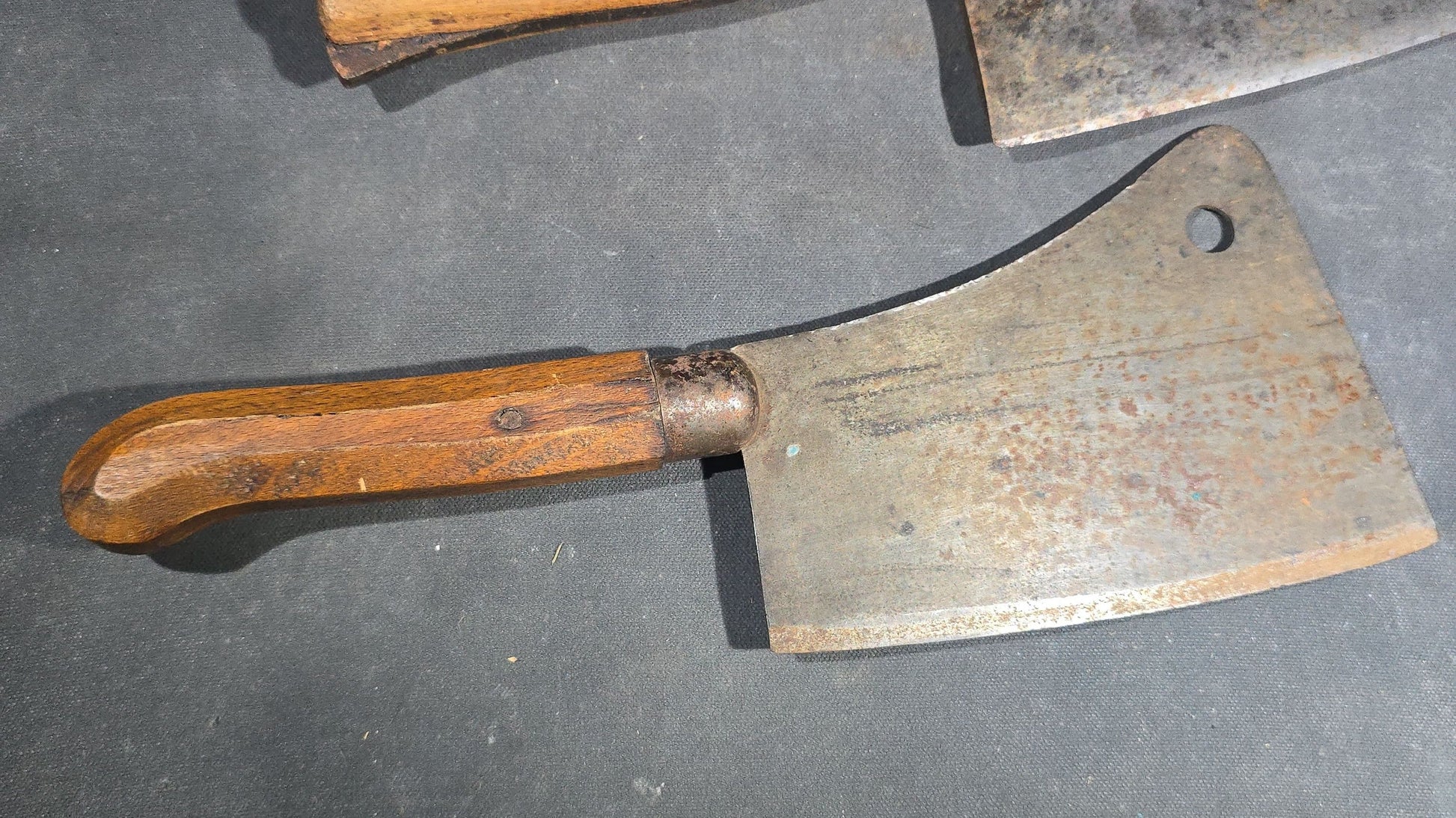 Grouping of Four Antique and Vintage Wood-Handled Meat Cleavers including Simco U.S.A.
