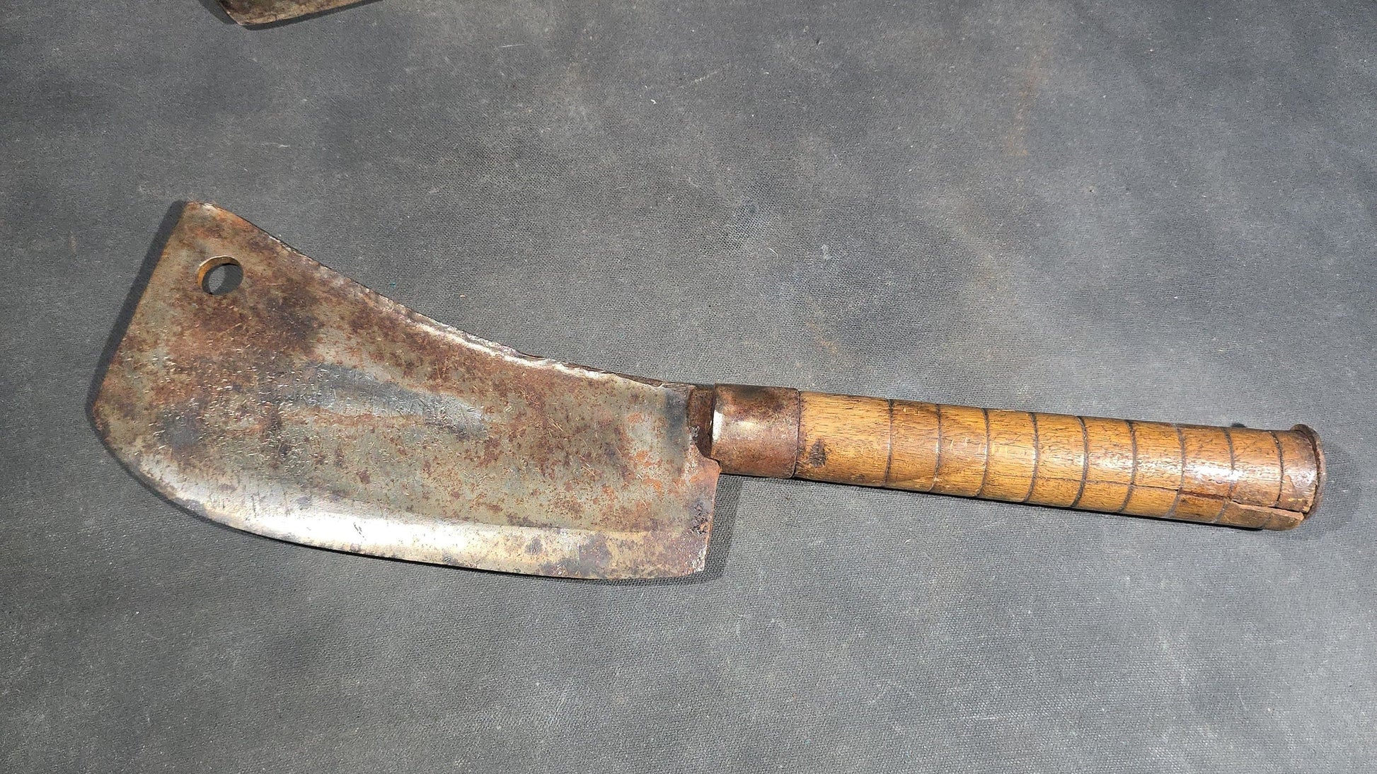 Grouping of Four Antique and Vintage Wood-Handled Meat Cleavers including Simco U.S.A.