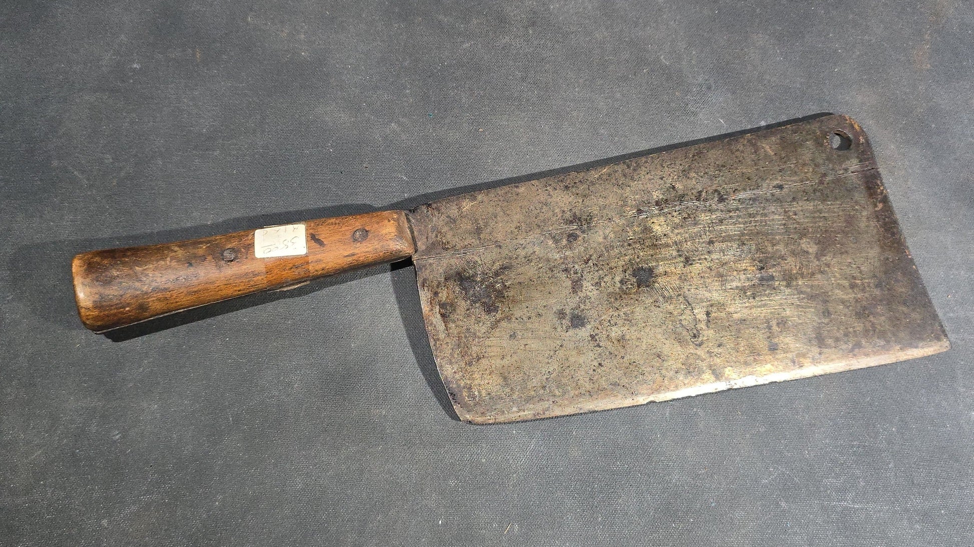 Grouping of Four Antique and Vintage Wood-Handled Meat Cleavers including Simco U.S.A.