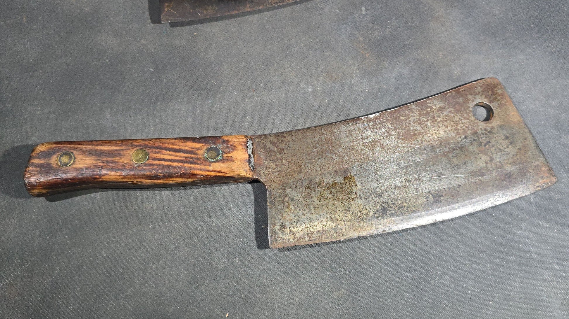 Grouping of Four Antique and Vintage Meat Cleavers including Foster Bros. Solid Steel No. 2190 and Magnetic Steel Warranted