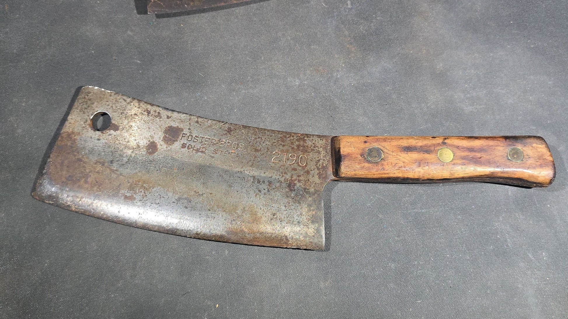 Grouping of Four Antique and Vintage Meat Cleavers including Foster Bros. Solid Steel No. 2190 and Magnetic Steel Warranted