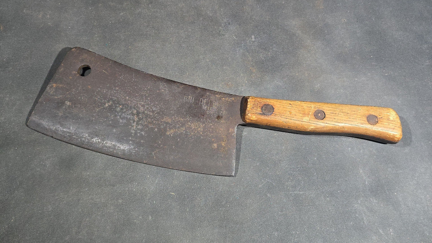 Grouping of Four Antique and Vintage Meat Cleavers including Foster Bros. Solid Steel No. 2190 and Magnetic Steel Warranted