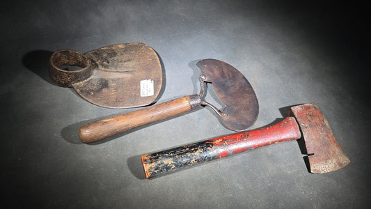Trio of Antique and Vintage Iron Hand Tools including a Hoe Head, Round Knife with Wood Handle, and Hatchet
