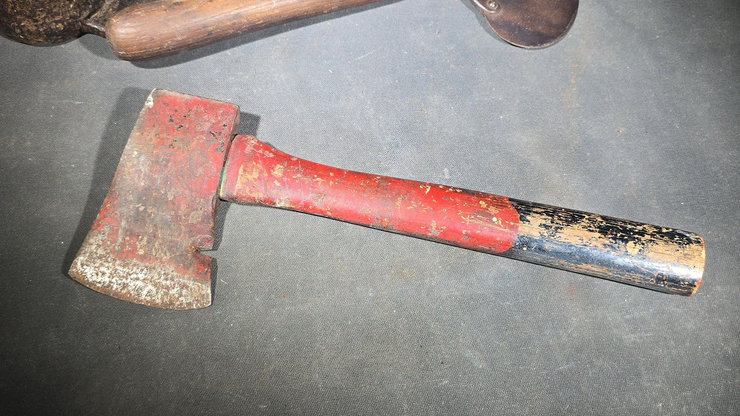 Trio of Antique and Vintage Iron Hand Tools including a Hoe Head, Round Knife with Wood Handle, and Hatchet