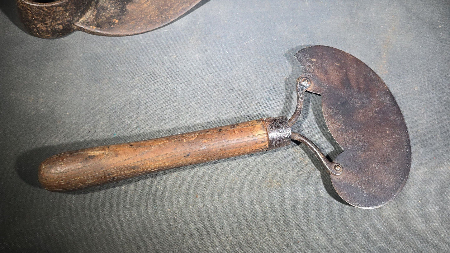 Trio of Antique and Vintage Iron Hand Tools including a Hoe Head, Round Knife with Wood Handle, and Hatchet