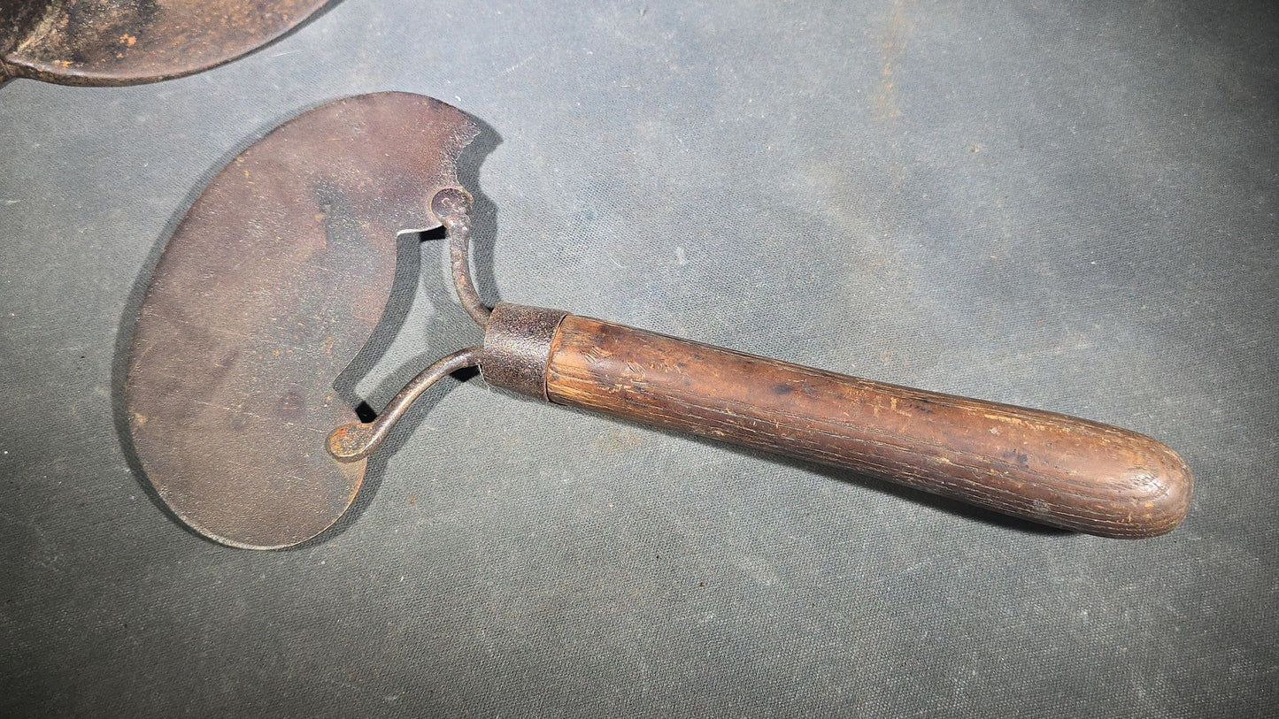 Trio of Antique and Vintage Iron Hand Tools including a Hoe Head, Round Knife with Wood Handle, and Hatchet