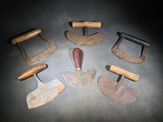Grouping of Six Antique Iron Food Choppers with Wood Handles including One Stamped S. Jones