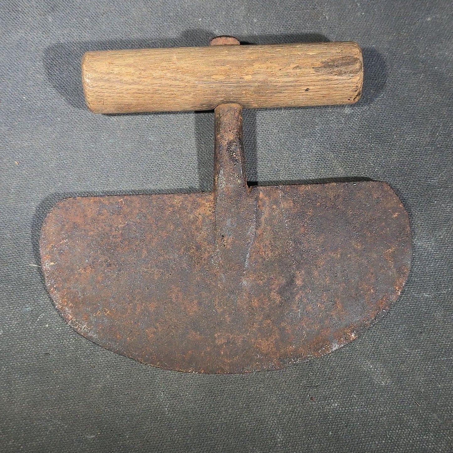 Grouping of Six Antique Iron Food Choppers with Wood Handles including One Stamped S. Jones