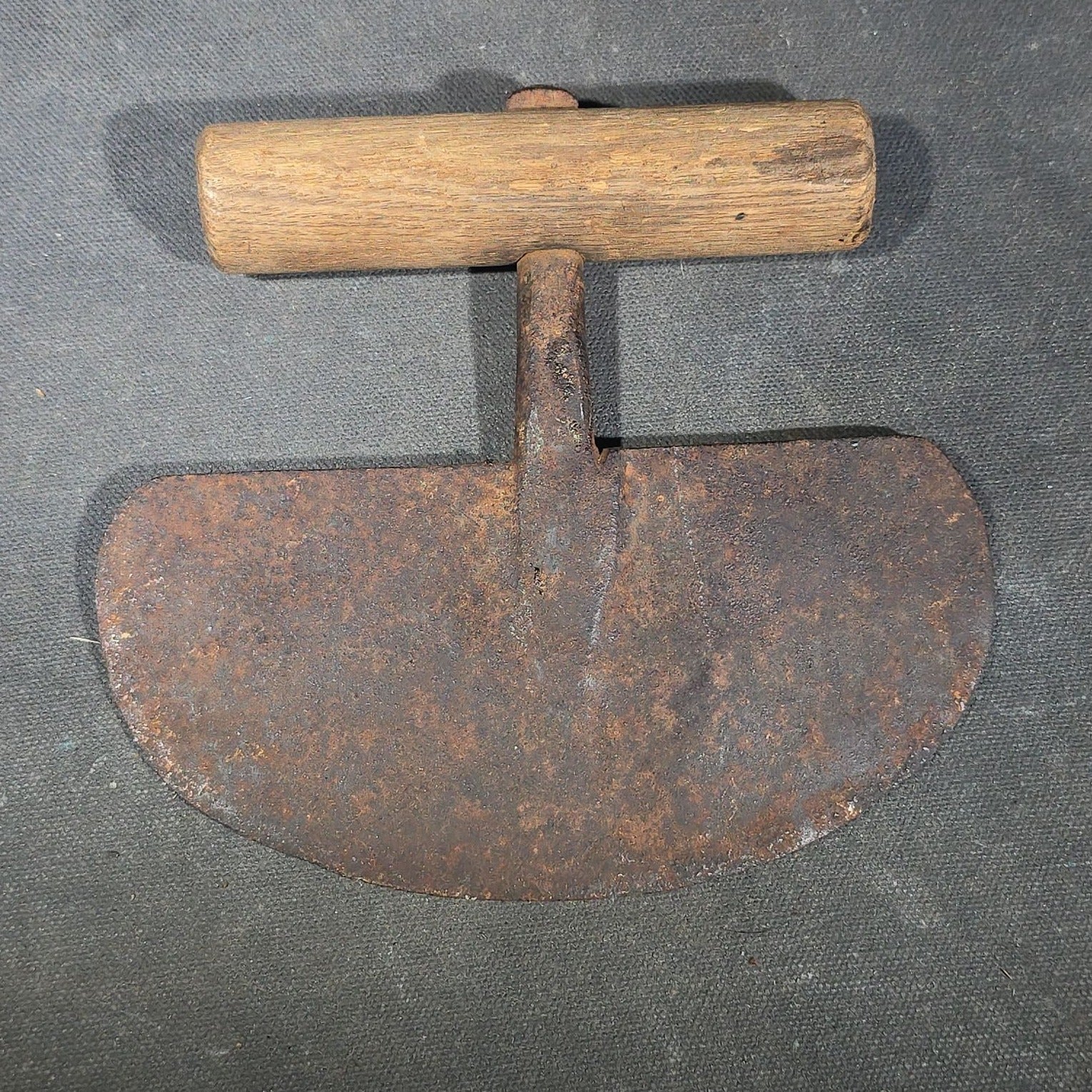 Grouping of Six Antique Iron Food Choppers with Wood Handles including One Stamped S. Jones