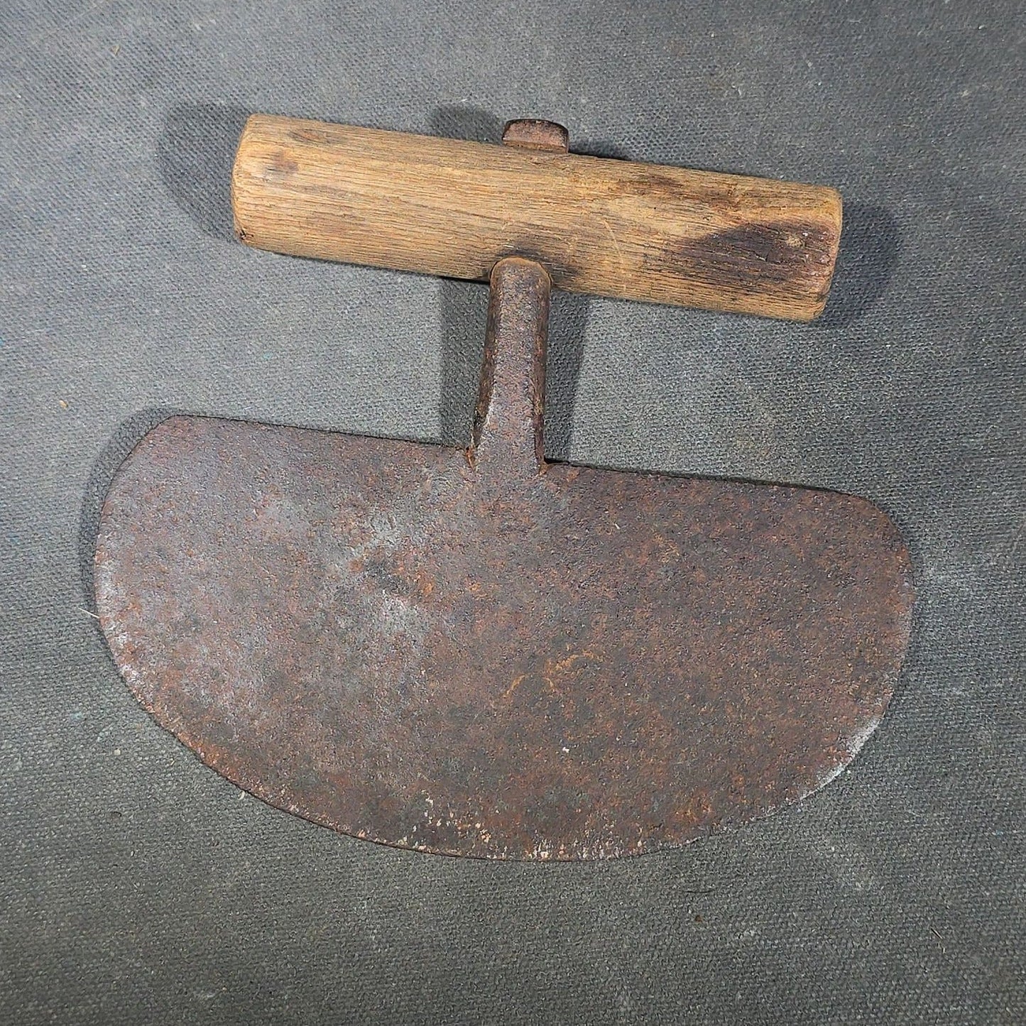 Grouping of Six Antique Iron Food Choppers with Wood Handles including One Stamped S. Jones