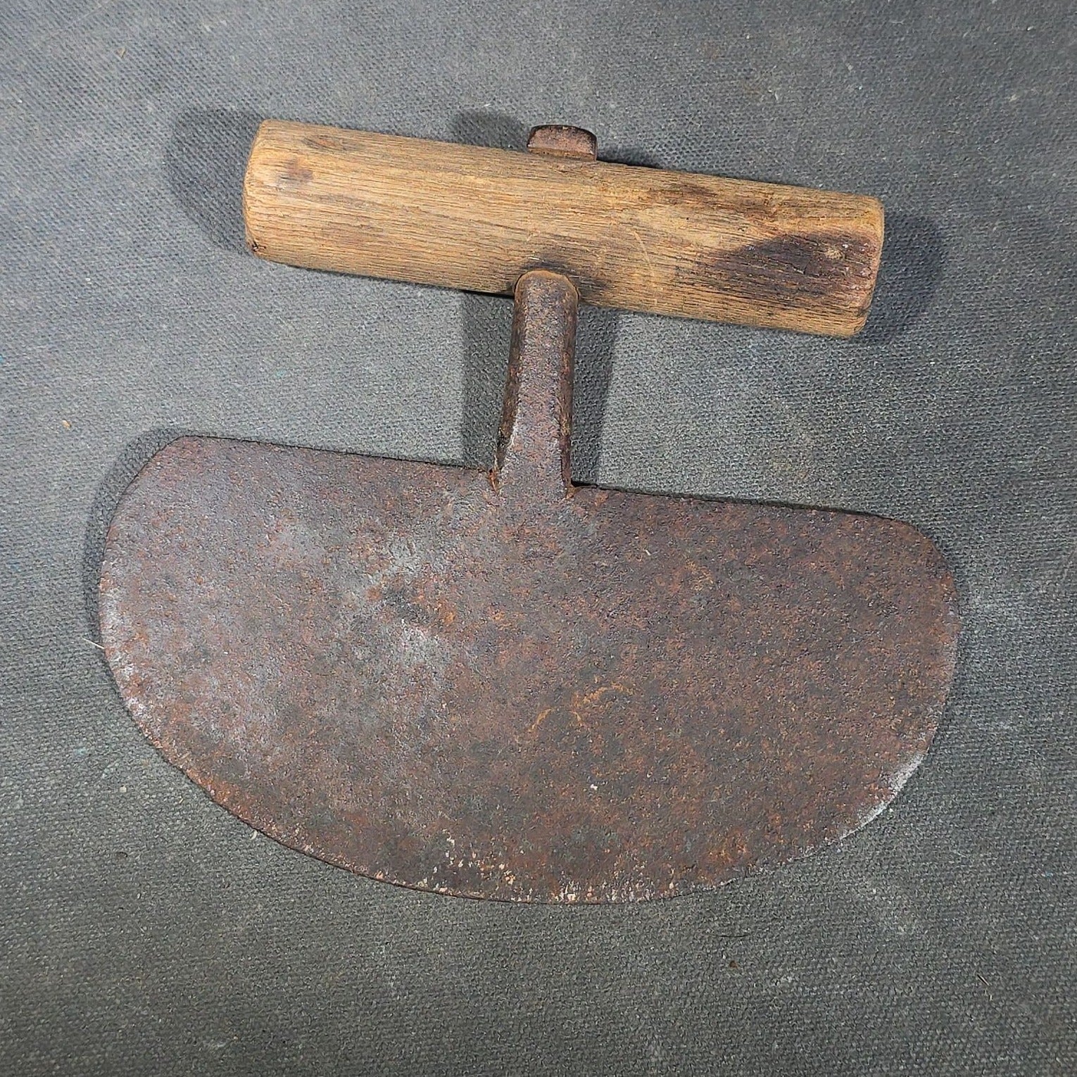 Grouping of Six Antique Iron Food Choppers with Wood Handles including One Stamped S. Jones