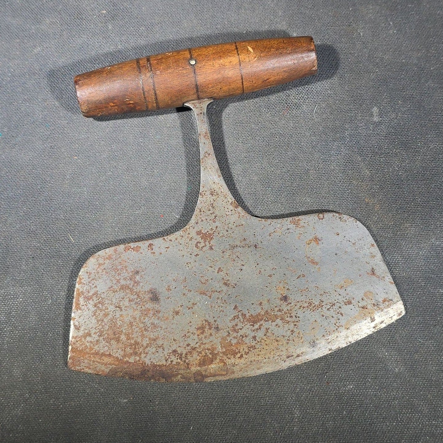 Grouping of Six Antique Iron Food Choppers with Wood Handles including One Stamped S. Jones