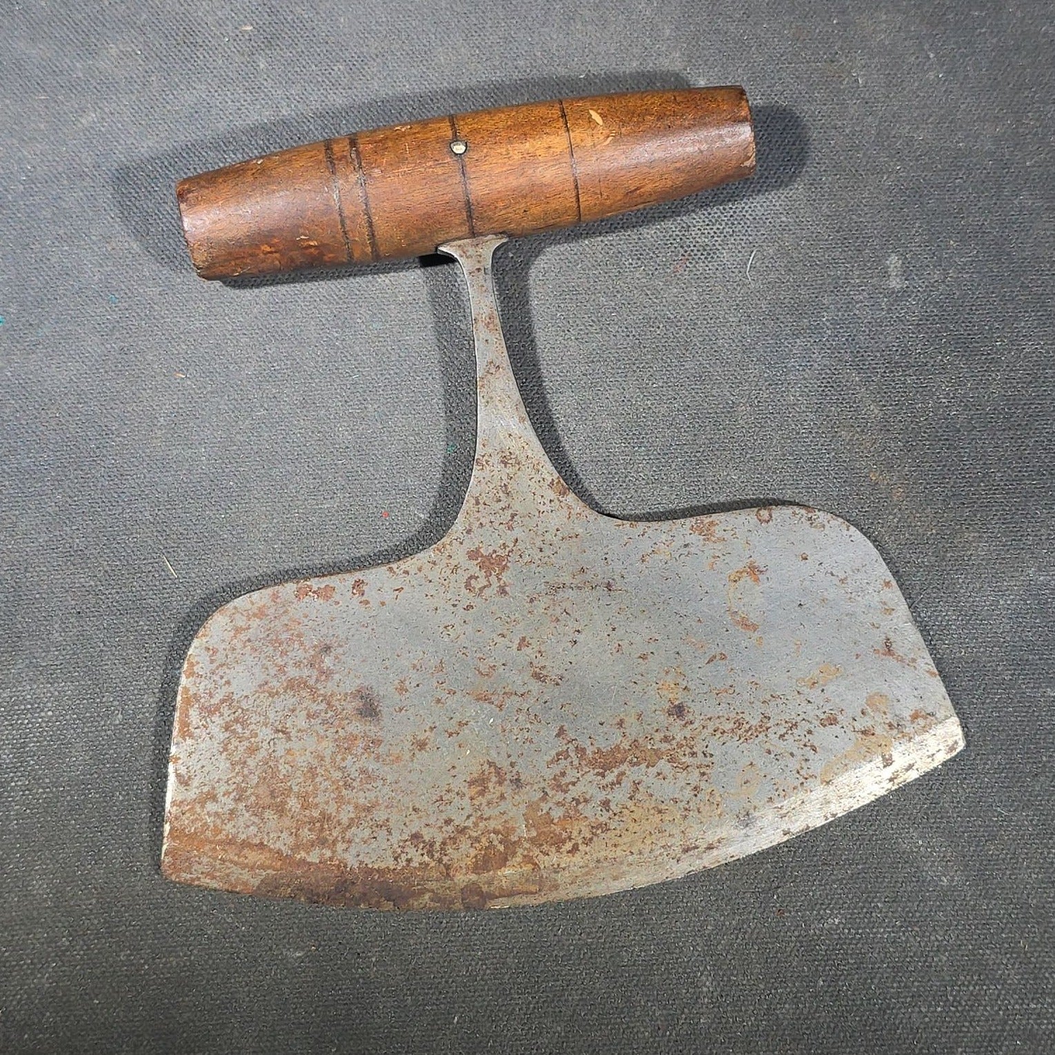 Grouping of Six Antique Iron Food Choppers with Wood Handles including One Stamped S. Jones