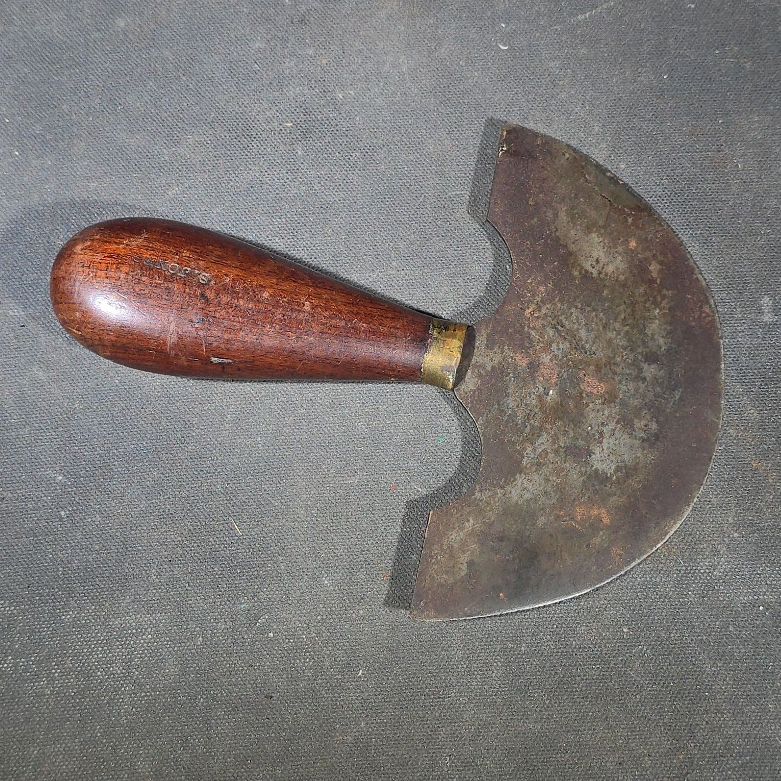 Grouping of Six Antique Iron Food Choppers with Wood Handles including One Stamped S. Jones