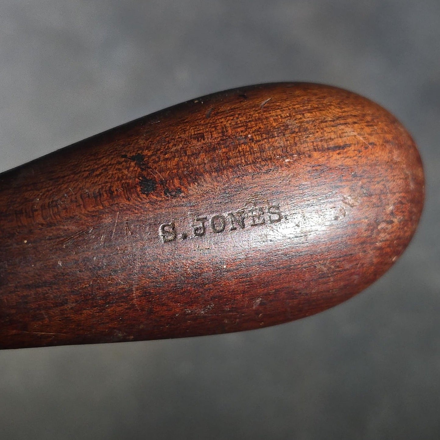Grouping of Six Antique Iron Food Choppers with Wood Handles including One Stamped S. Jones