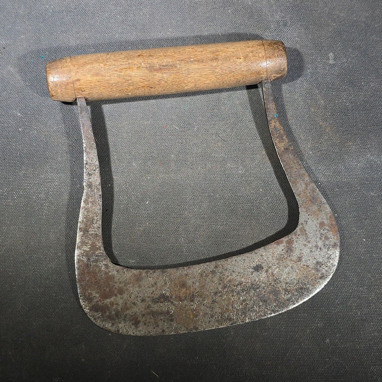 Grouping of Six Antique Iron Food Choppers with Wood Handles including One Stamped S. Jones