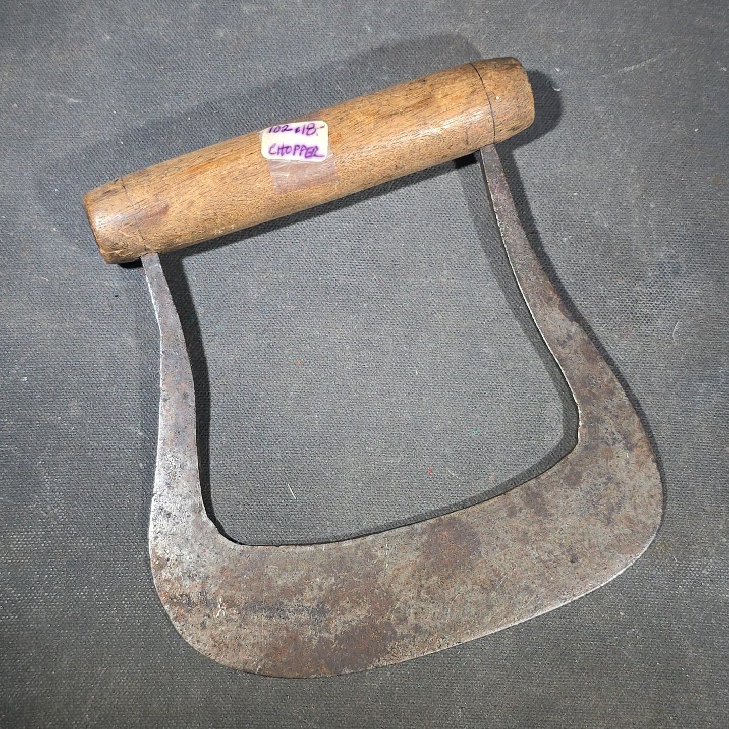 Grouping of Six Antique Iron Food Choppers with Wood Handles including One Stamped S. Jones