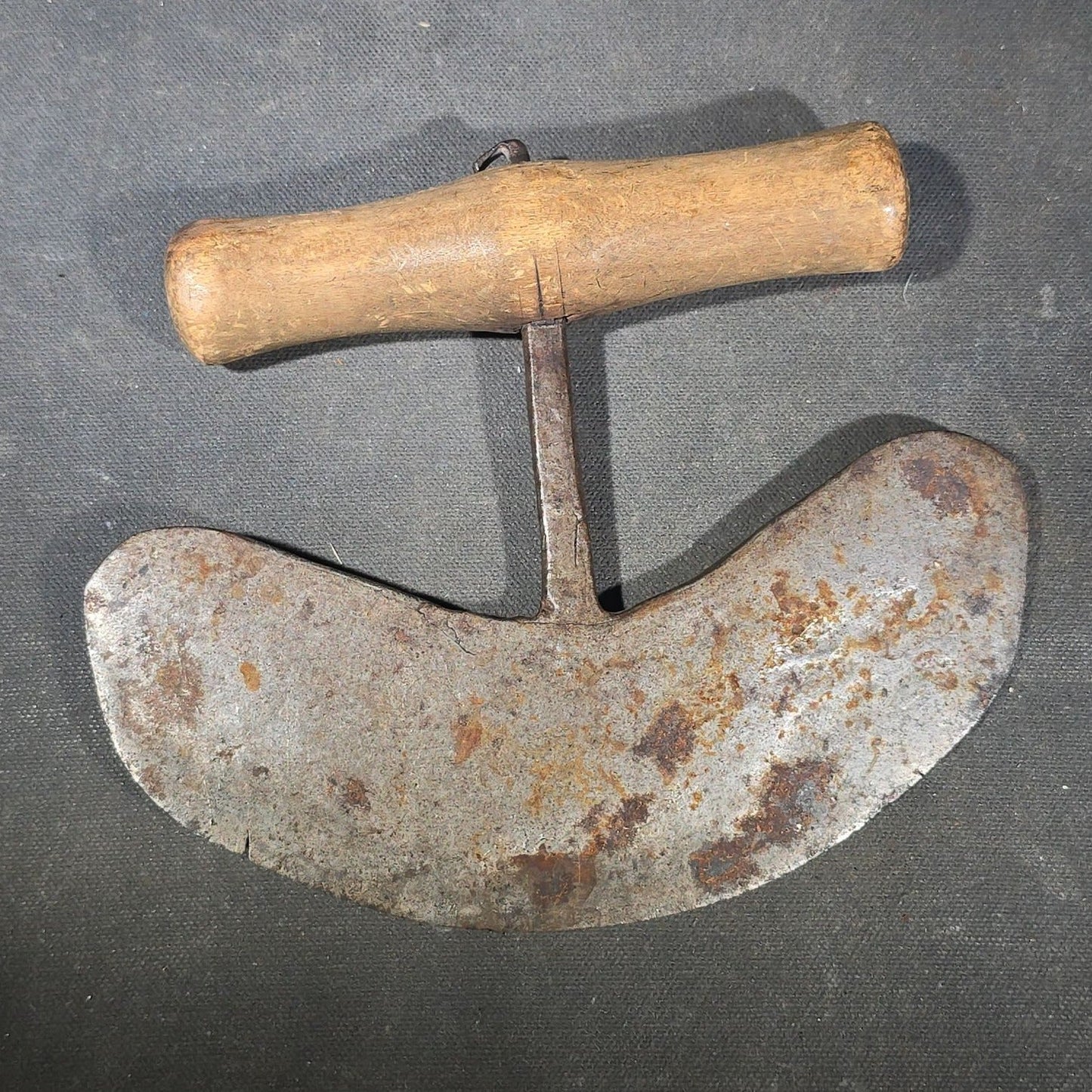 Grouping of Six Antique Iron Food Choppers with Wood Handles including One Stamped S. Jones
