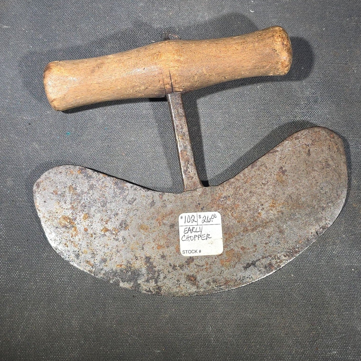 Grouping of Six Antique Iron Food Choppers with Wood Handles including One Stamped S. Jones