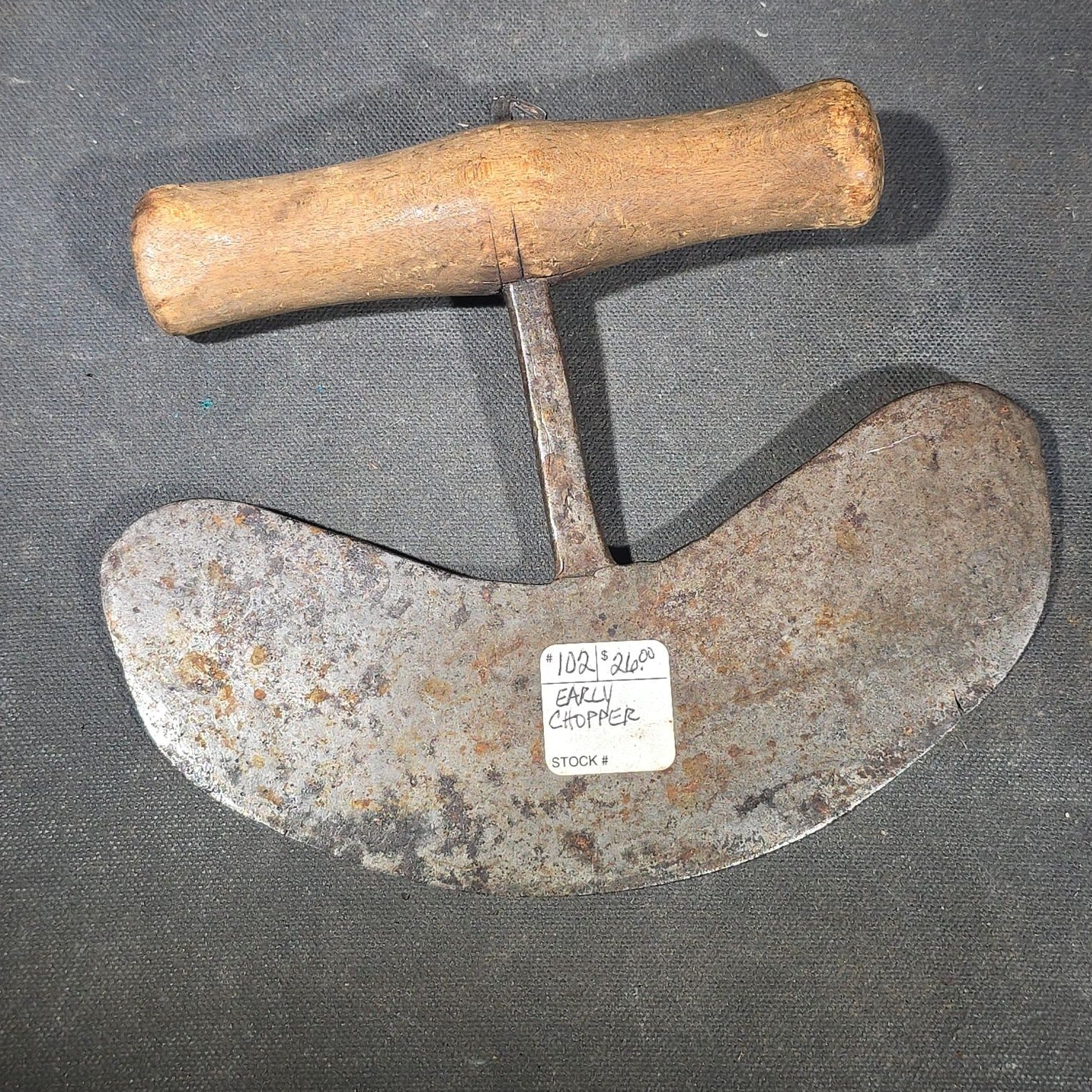 Grouping of Six Antique Iron Food Choppers with Wood Handles including One Stamped S. Jones