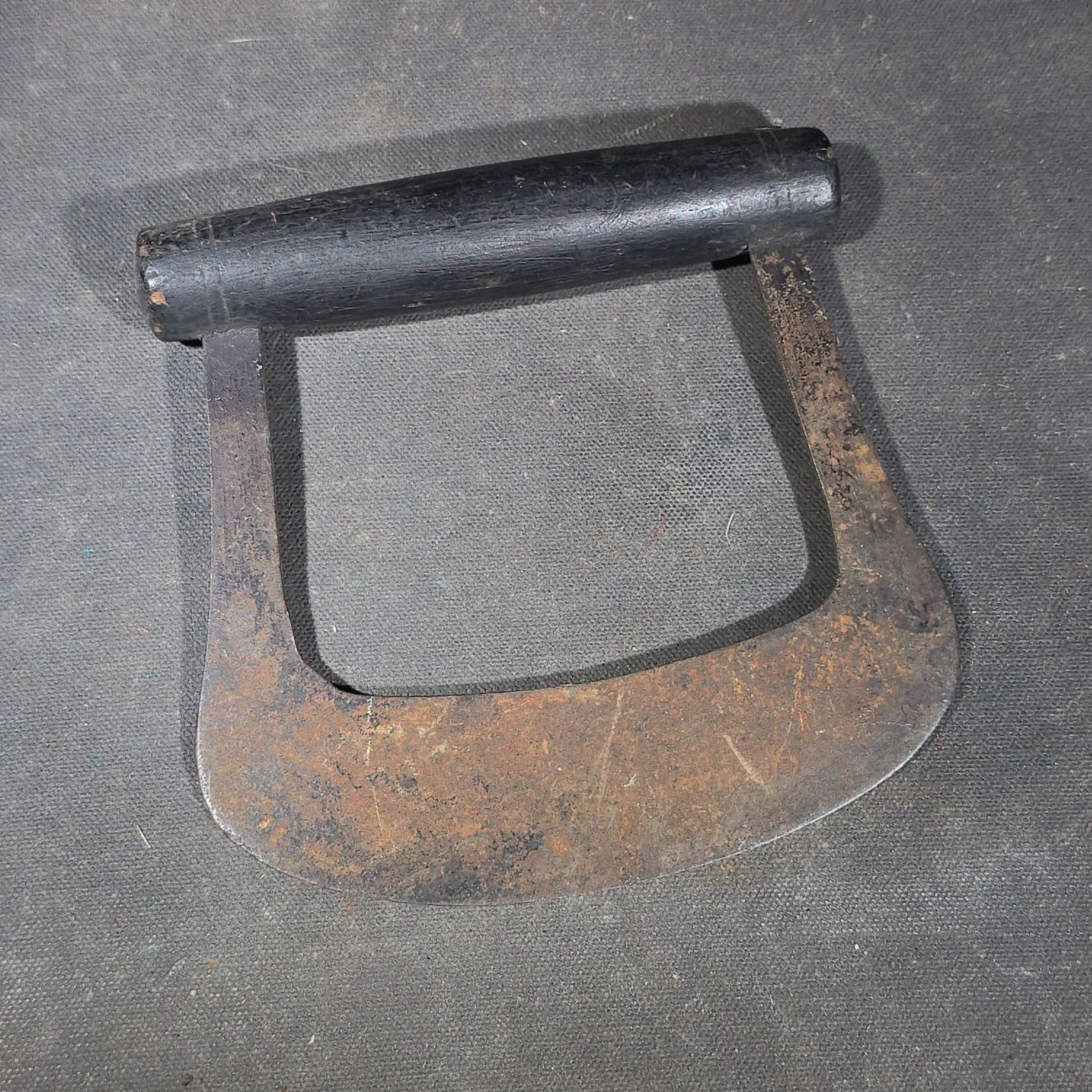 Grouping of Six Antique Iron Food Choppers with Wood Handles including One Stamped S. Jones