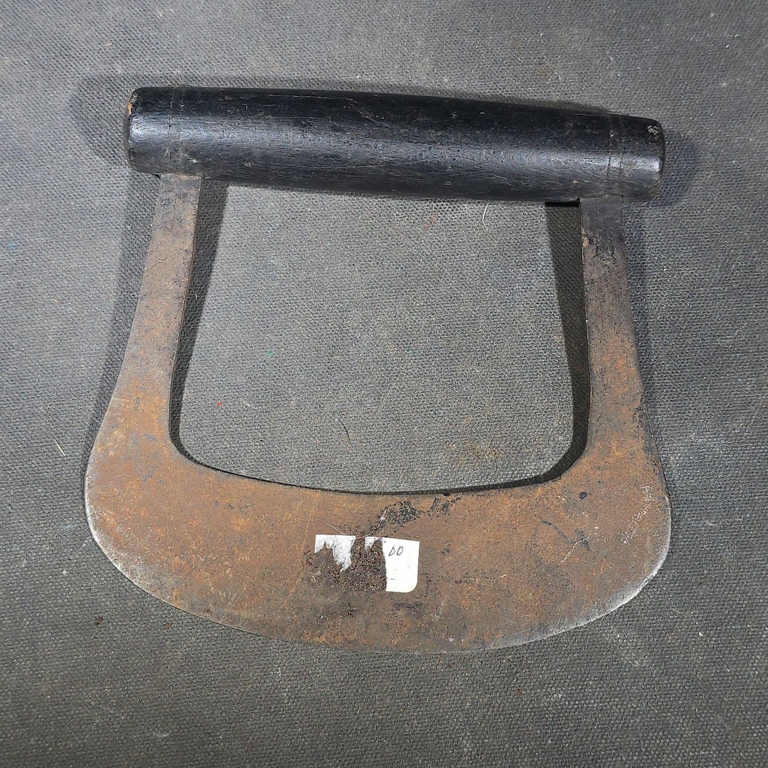 Grouping of Six Antique Iron Food Choppers with Wood Handles including One Stamped S. Jones