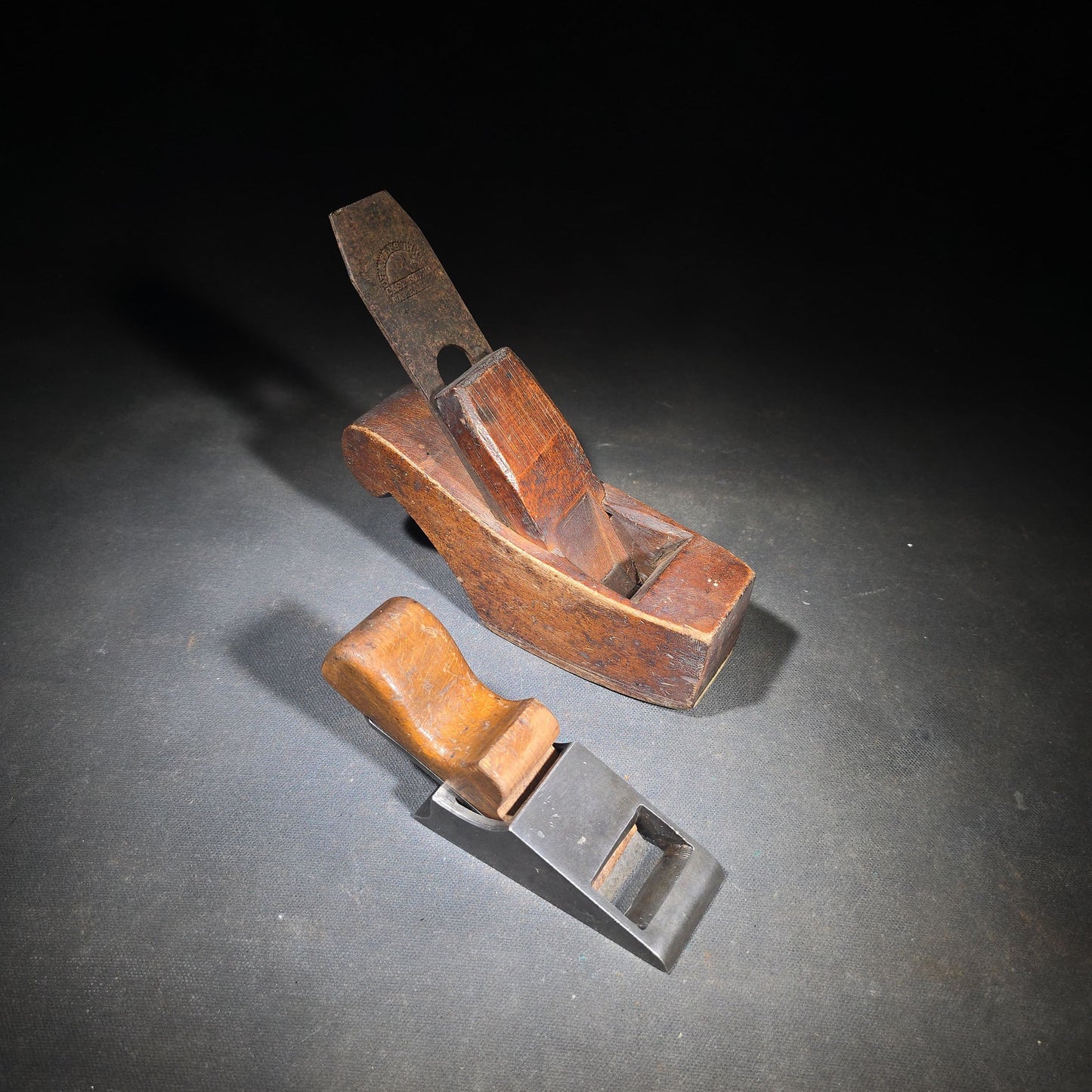 Pair of Antique Hand Planes including a Wooden Smoothing Plane with Charles Buck Cast Steel Blade and a Cast Iron Block Plane with Wooden Knob