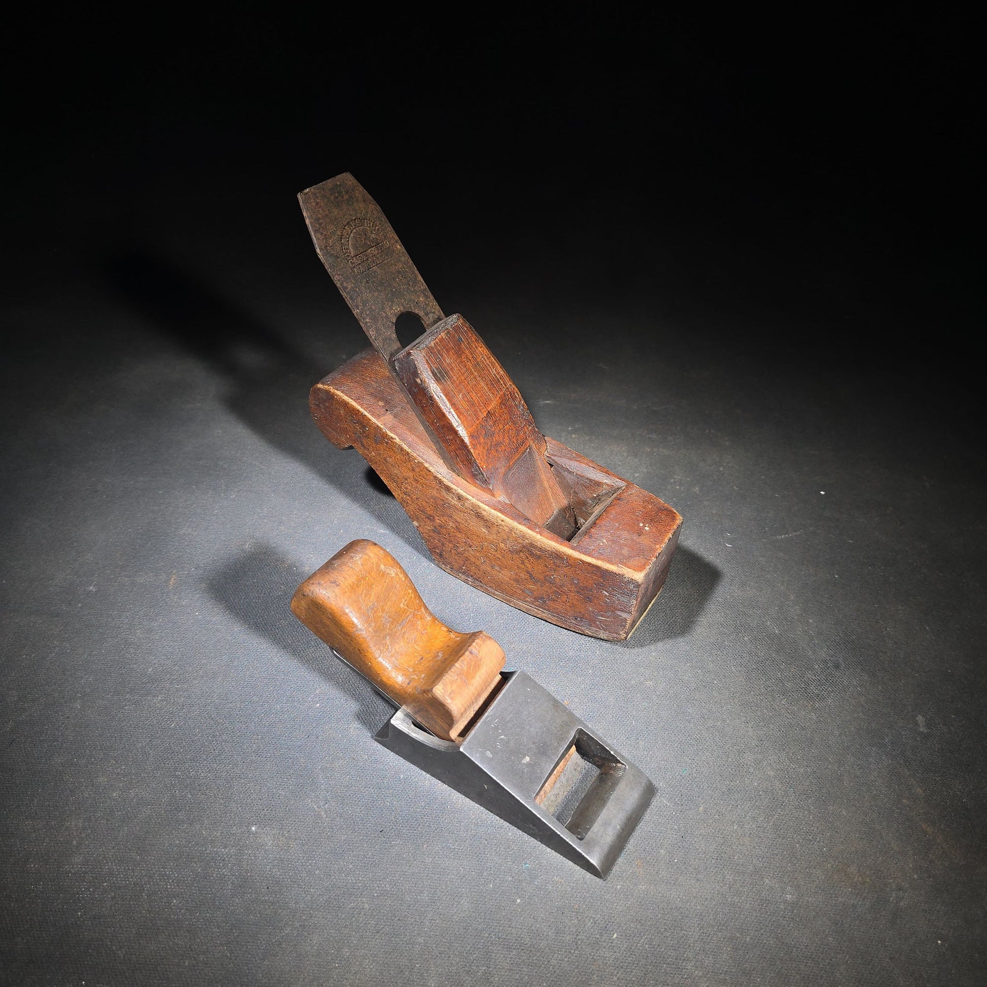 Pair of Antique Hand Planes including a Wooden Smoothing Plane with Charles Buck Cast Steel Blade and a Cast Iron Block Plane with Wooden Knob