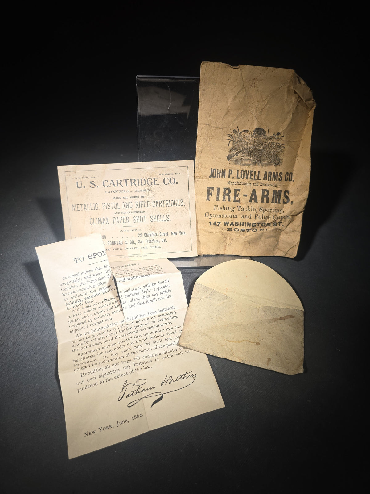 Trio of Antique Firearms and Ammunition Advertising Ephemera including John P. Lovell Arms Co. Paper Bag, U.S. Cartridge Co. Target Card, and 1862 Tatham Brothers "To Sportsmen!" Circular