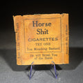 Lot 188 - Vintage "Horse Shit Cigarettes" Novelty Gag Cigarette Pack Wrapper, "Try One You Mouching Bastard," Factory 606, District of Kansas