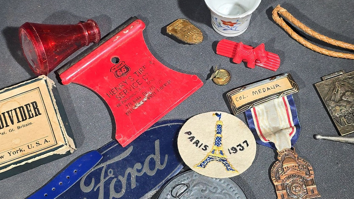 Grouping of Antique and Vintage Junk Drawer Smalls including Eagle Pencil Co. Compass Box, Ford Key Fob, Military Medals and Belt Buckle, Eyeglasses, Match Safe, and Pinback Buttons