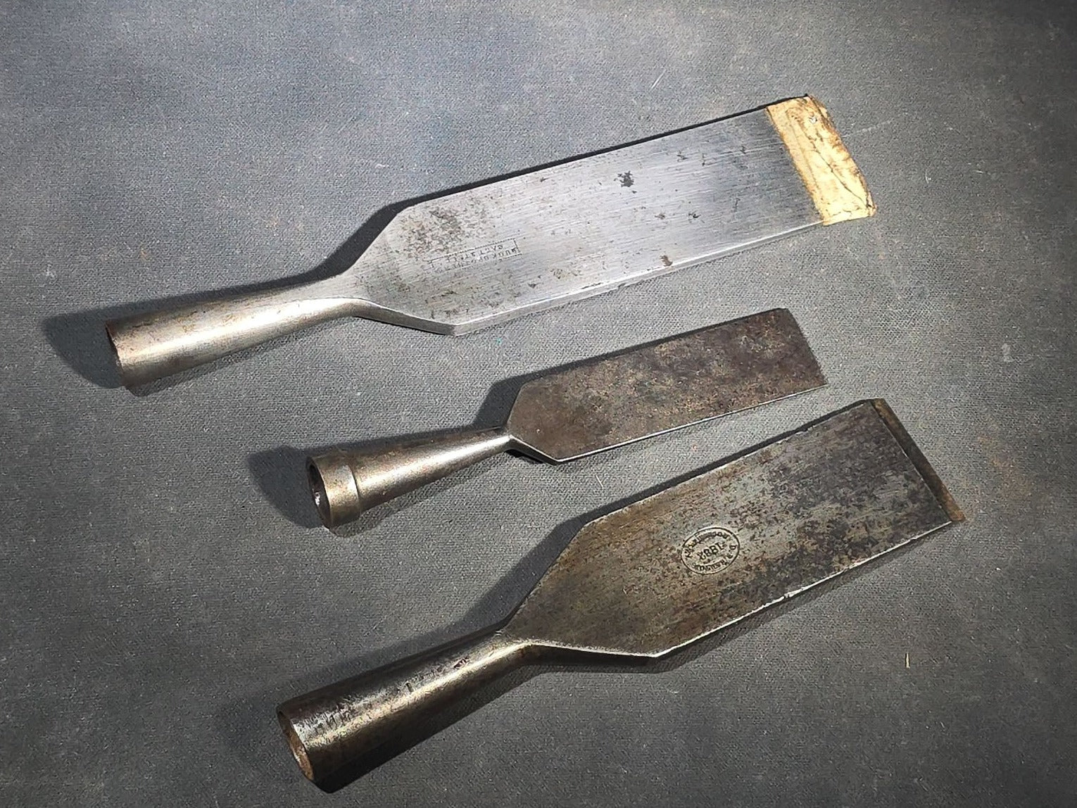 Grouping of Five Antique Chisels with Wood Handles including Butcher Cast Steel