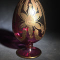 Lot 141 - Modern Egyptian Glass Egg with Gold Floral Decoration on Pedestal Base