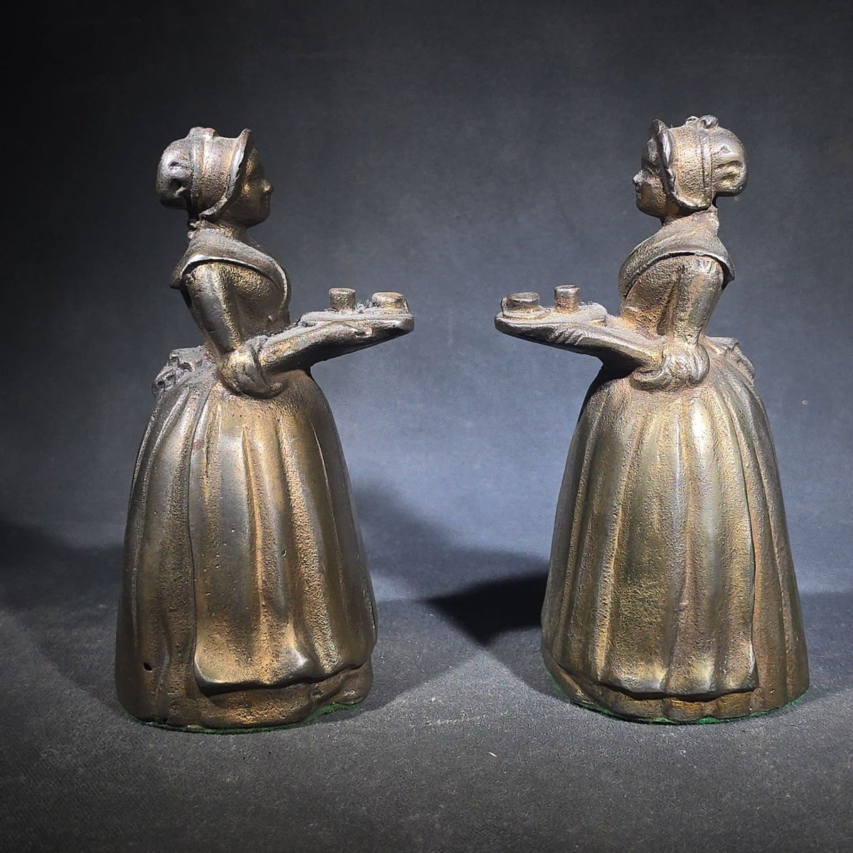 Pair of Antique Cast Iron Advertising Bookends and "Choice Recipes" Booklet, Walter Baker & Co. Ltd., Dorchester, Massachusetts, "La Belle Chocolatiere" Chocolate Maid Figure