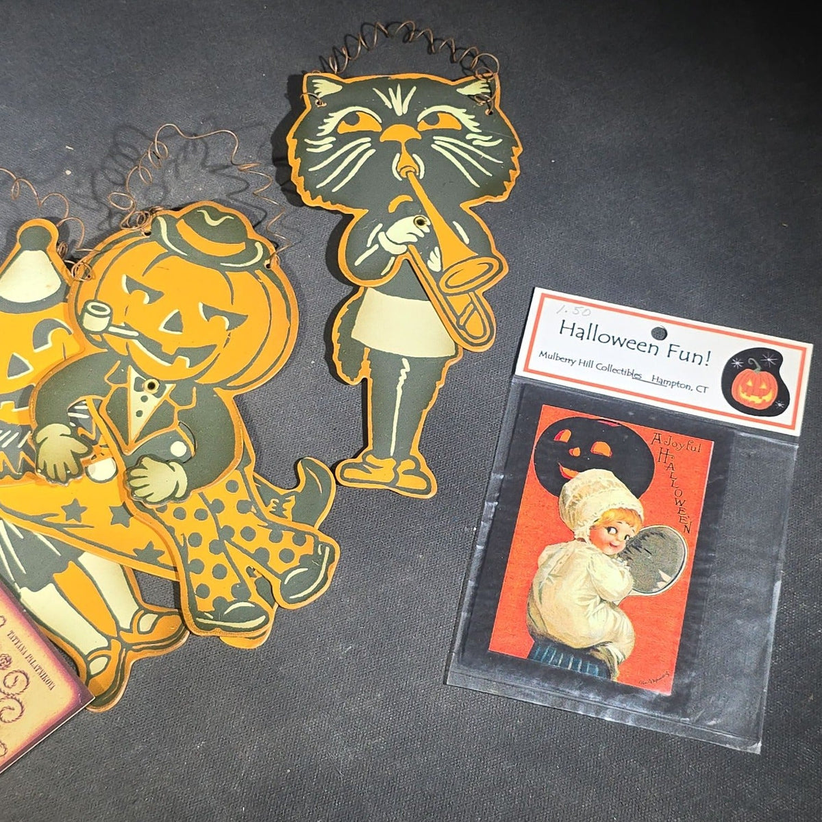 Grouping of Seven Modern Halloween Items including Six Retro-Style Jointed Metal Black Cat and Jack-O-Lantern Figures, Designed by Tatyana Palatnikova for Ohio Wholesale Inc., and "A Joyful Halloween" Reproduction Print