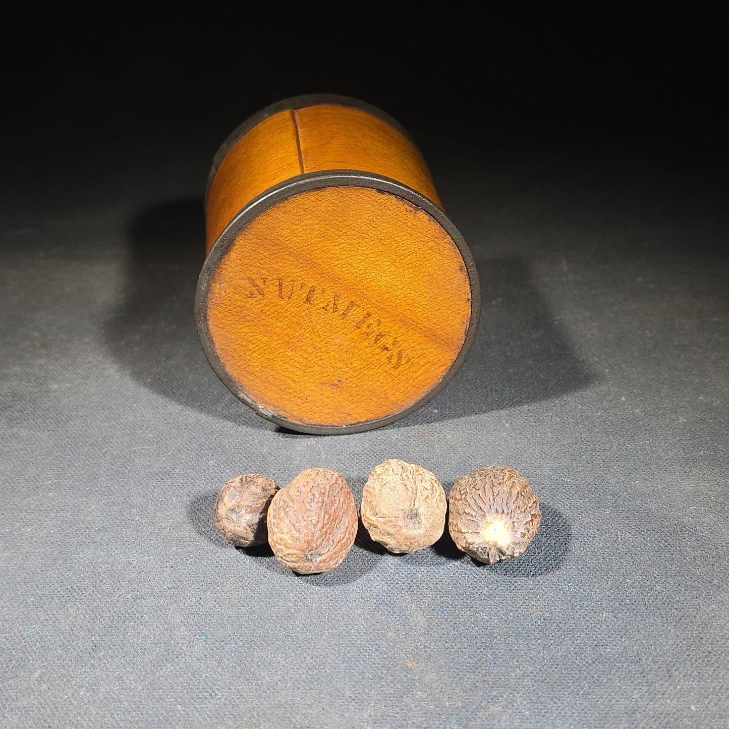 Antique Stenciled Wooden Nutmeg Canister with Metal Bands and Lid, Containing Four Whole Nutmegs