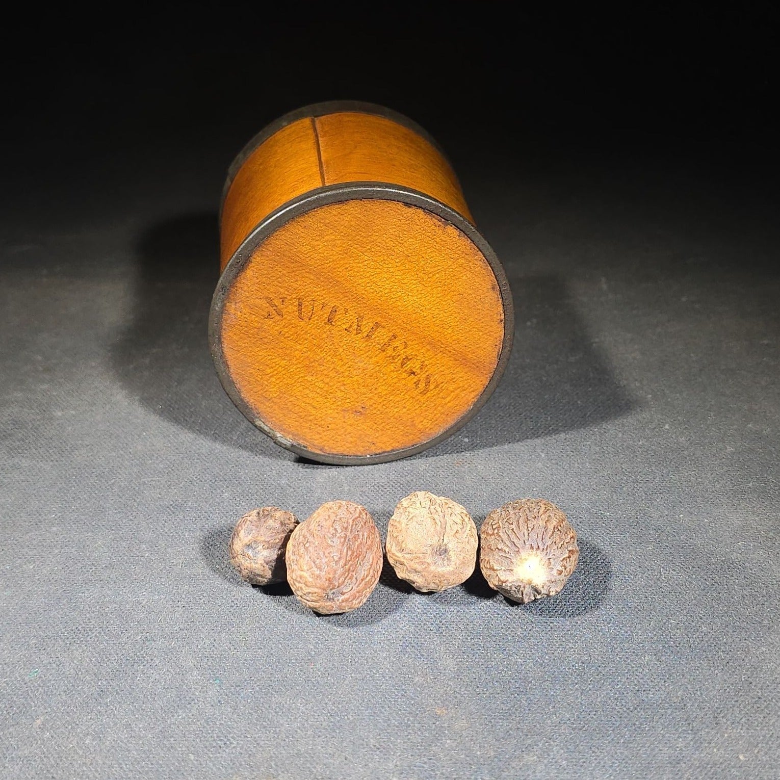 Antique Stenciled Wooden Nutmeg Canister with Metal Bands and Lid, Containing Four Whole Nutmegs