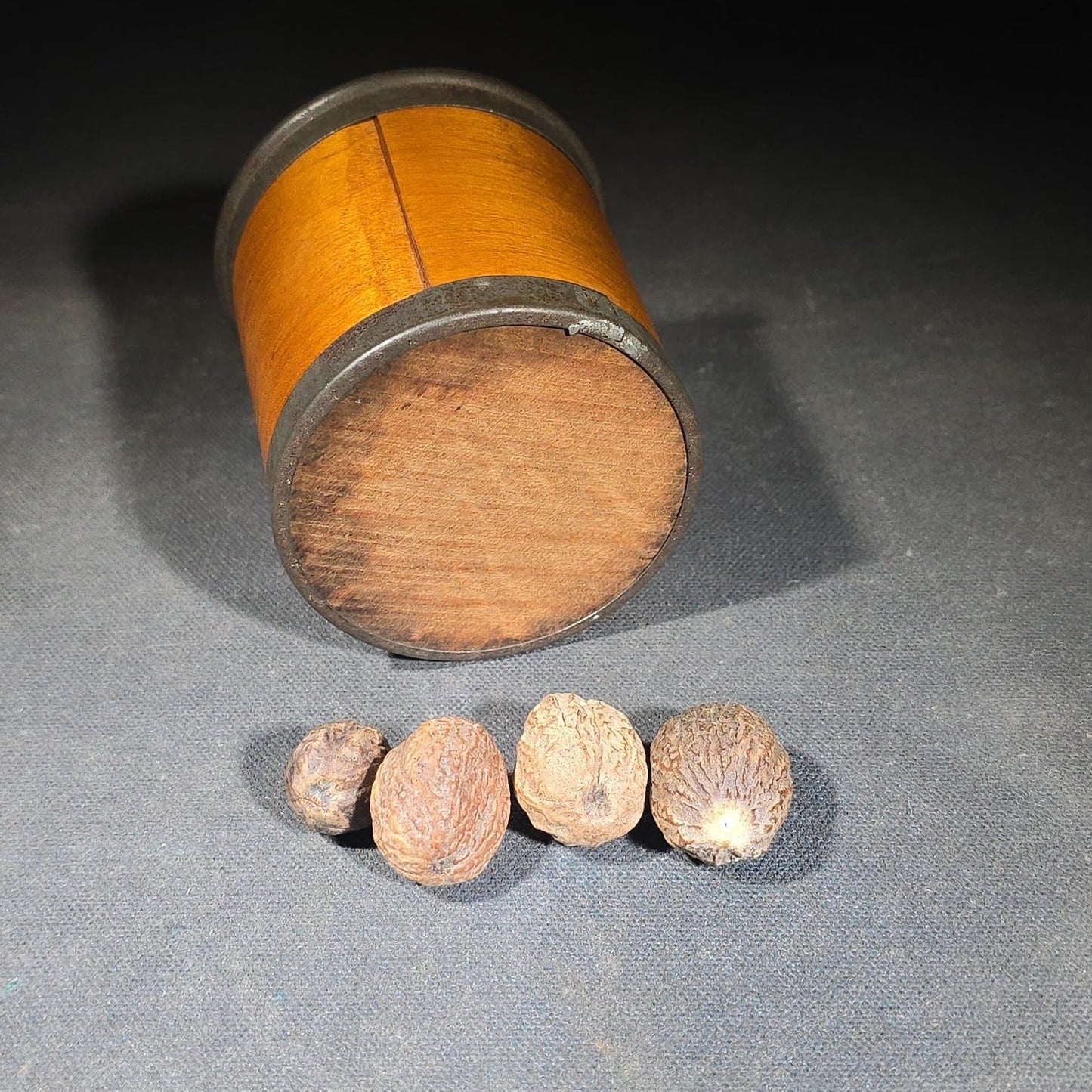 Antique Stenciled Wooden Nutmeg Canister with Metal Bands and Lid, Containing Four Whole Nutmegs
